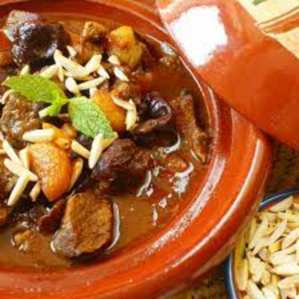 Tajine d agneau cuit lentement aux pruneaux, abricots & amandes